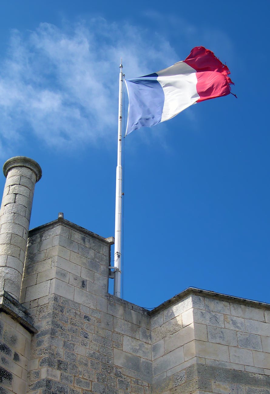 french flag on the castle